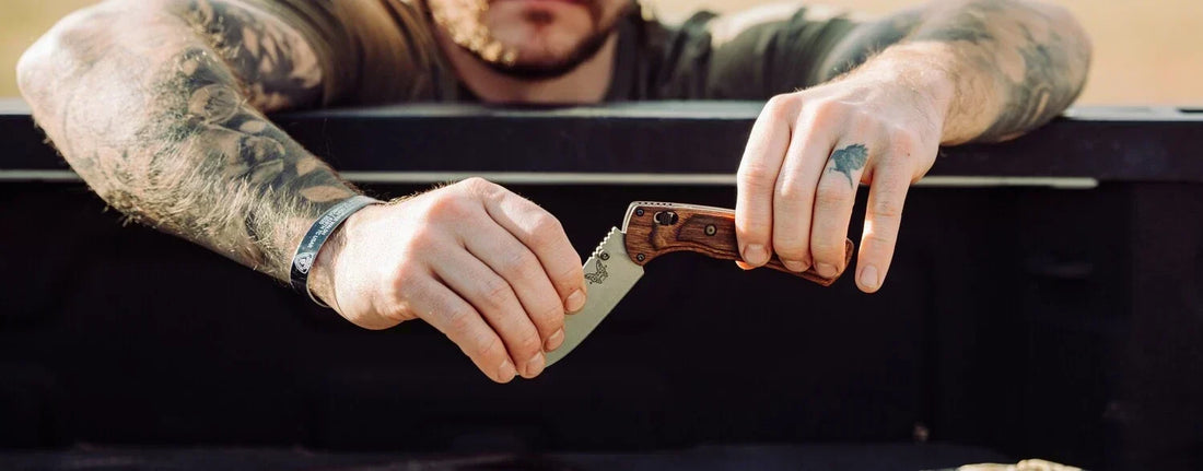 Hunter using the SlipRidge™ folding field-dressing knife during big-game processing