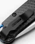Mini Bugout® Carbon Fiber knife close-up view - AXIS Lock Detail | Benchmade Knife Co.