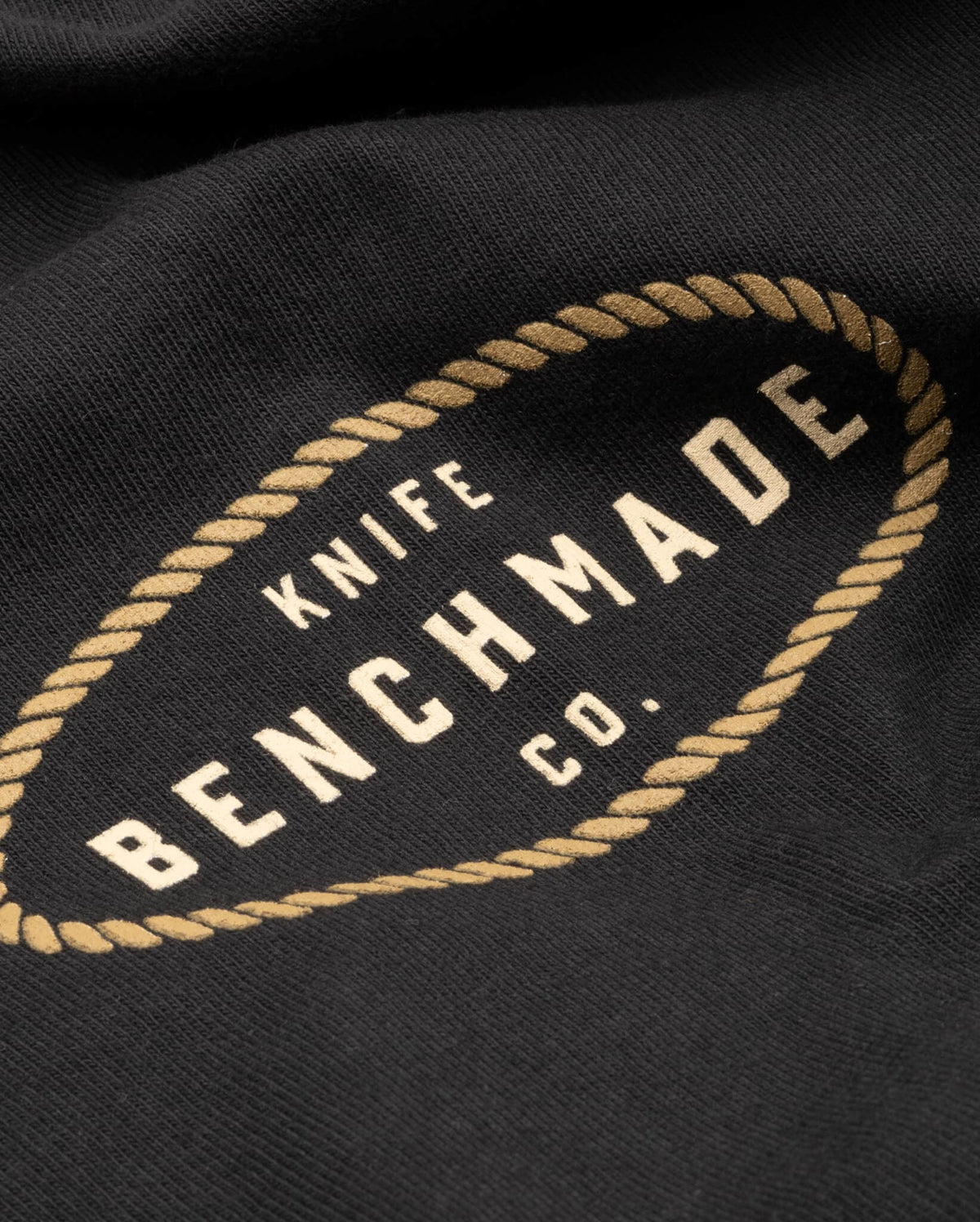 Knots SS Tee - Close-up of rope border Benchmade Knife Co circular logo | Benchmade Knife Co.