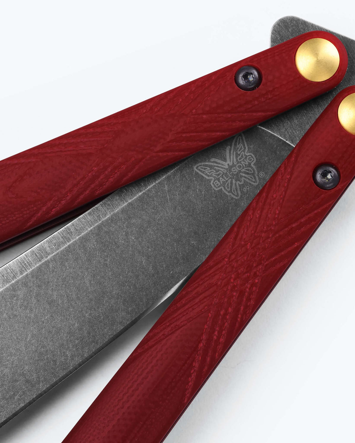 Necron™ Ruby Red G10 - Close-up Handle Detail | Benchmade Knife Co.