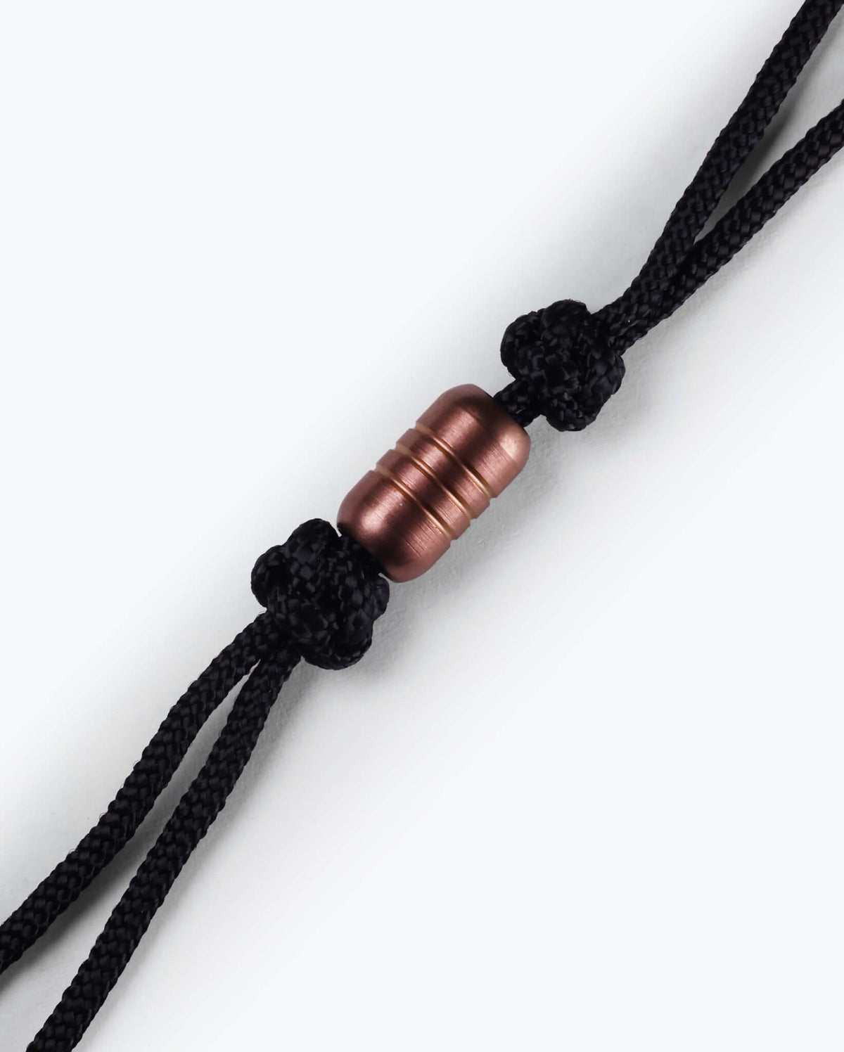 Rose Gold PVD Stainless Steel Lanyard Bead - Close-Up Detail | Benchmade Knife Co.