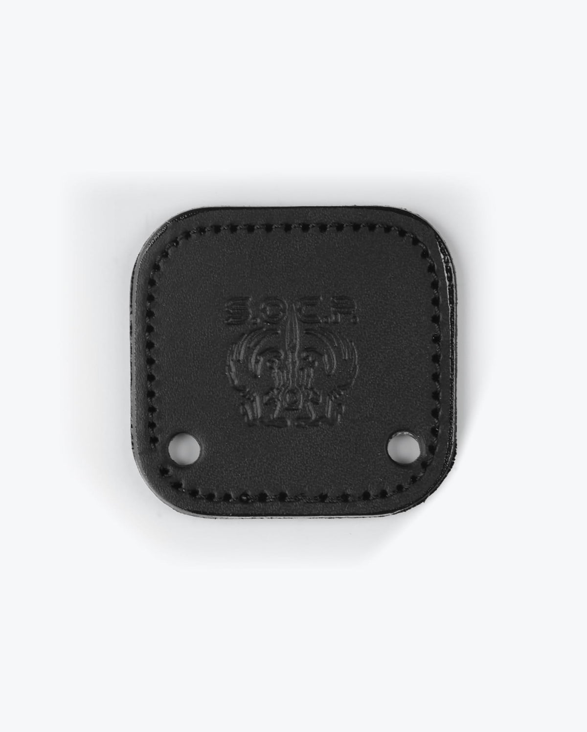 SOCP® Leather Backplate Black - Logo Detail Close-Up Embossed SOCP | Benchmade Knife Co.