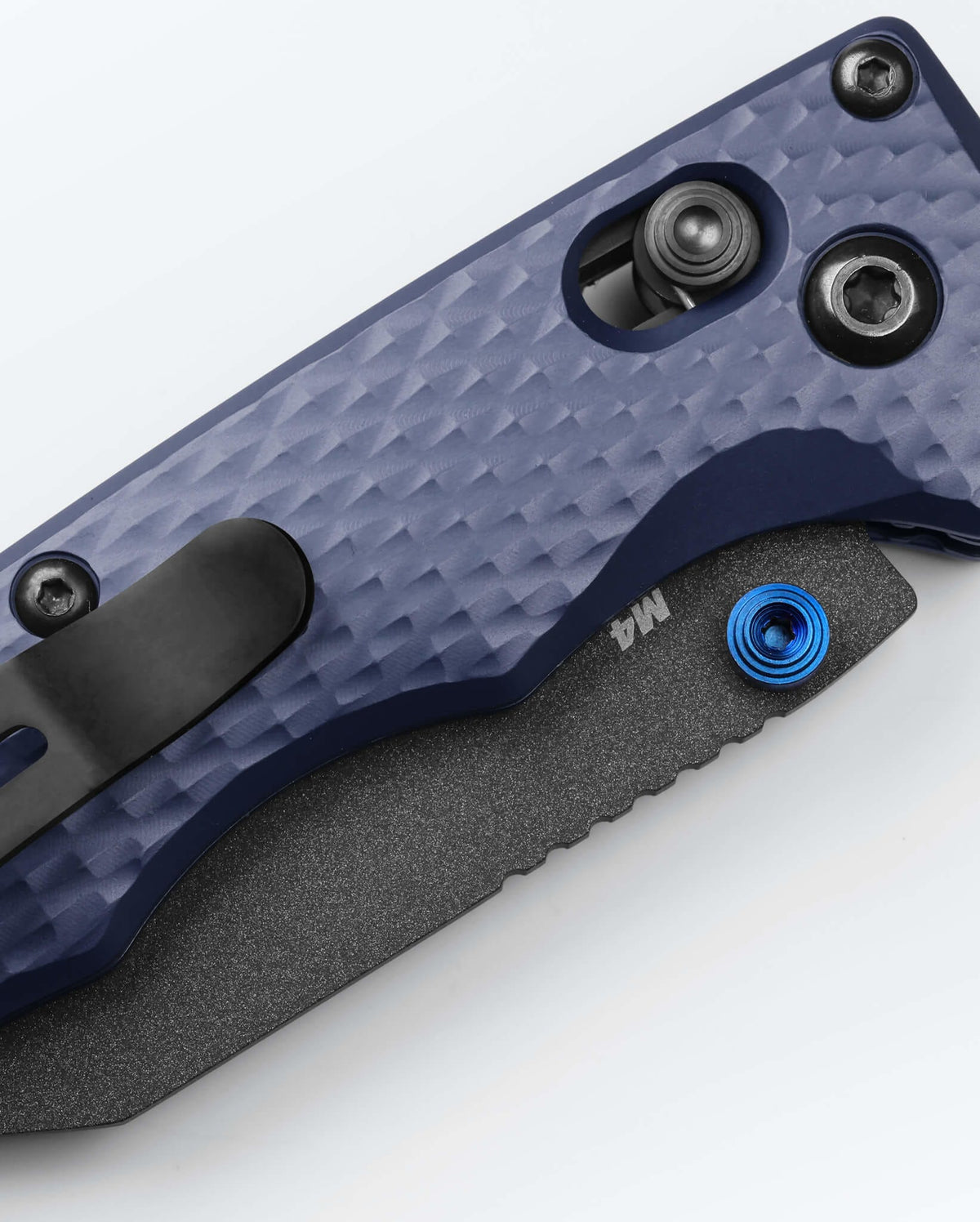 Full Immunity™ Crater Blue Aluminum Wharncliffe - Handle Detail Close Up | Benchmade Knife Co.