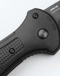 Black Benchmade Claymore Handle Detail - Push Button & Texturing Close-up | Benchmade Knife Co.