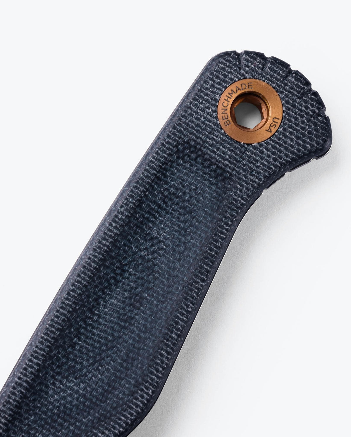 Benchmade Dacian™ Blue Denim Micarta Handle Detail - Copper Lanyard Hole | Benchmade Knife Co.