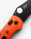 Orange Custom Mini Griptillian® - AXIS Lock Close-up Detail | Benchmade Knife Co.