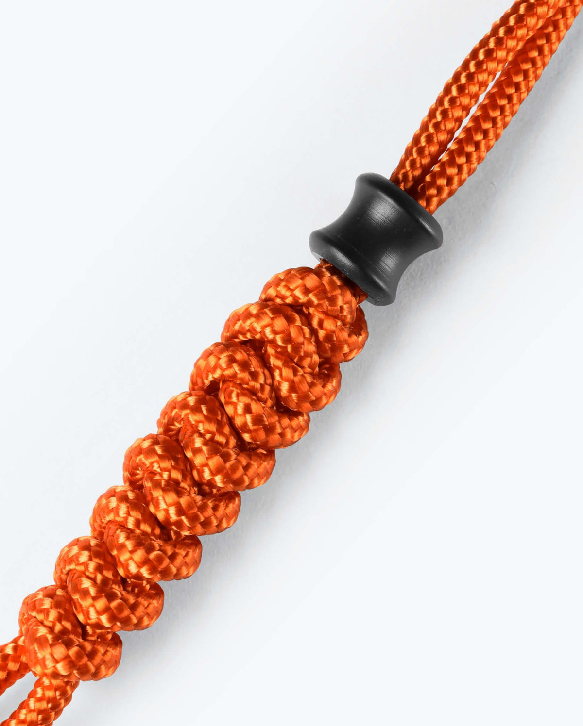 Black Nylon Bead and Orange Paracord Detail - Close-Up View | Benchmade Knife Co.
