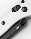 Mini Bugout® White Grivory® - AXIS Lock Mechanism Close-up Detail | Benchmade Knife Co.