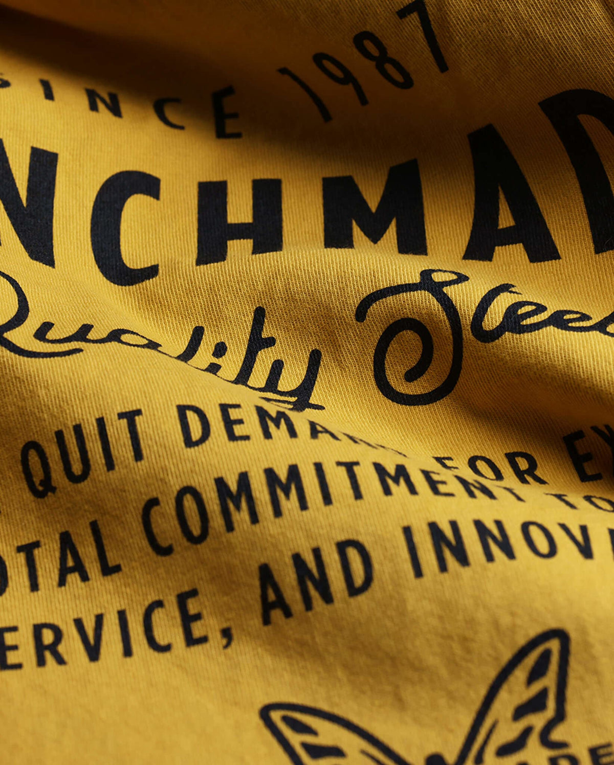 Quality Steel Basic Tee - Close-up Detail of Back Heritage Graphic | Benchmade Knife Co.
