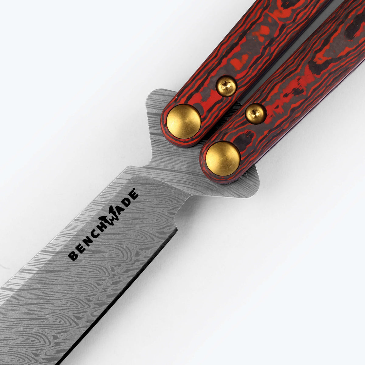 Necron™ Lava Flow Red close-up handle detail gold class butterfly knife | Benchmade Knife Co.