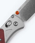 Bugout® Grey/Redstone Aluminum & Richlite - Close-up AXIS Lock Detail | Benchmade Knife Co.