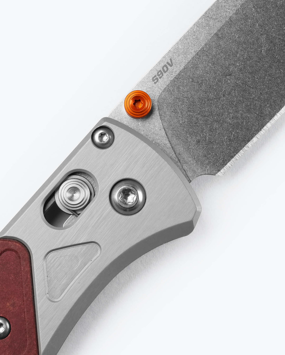 Bugout® Grey/Redstone Aluminum & Richlite - Close-up AXIS Lock Detail | Benchmade Knife Co.