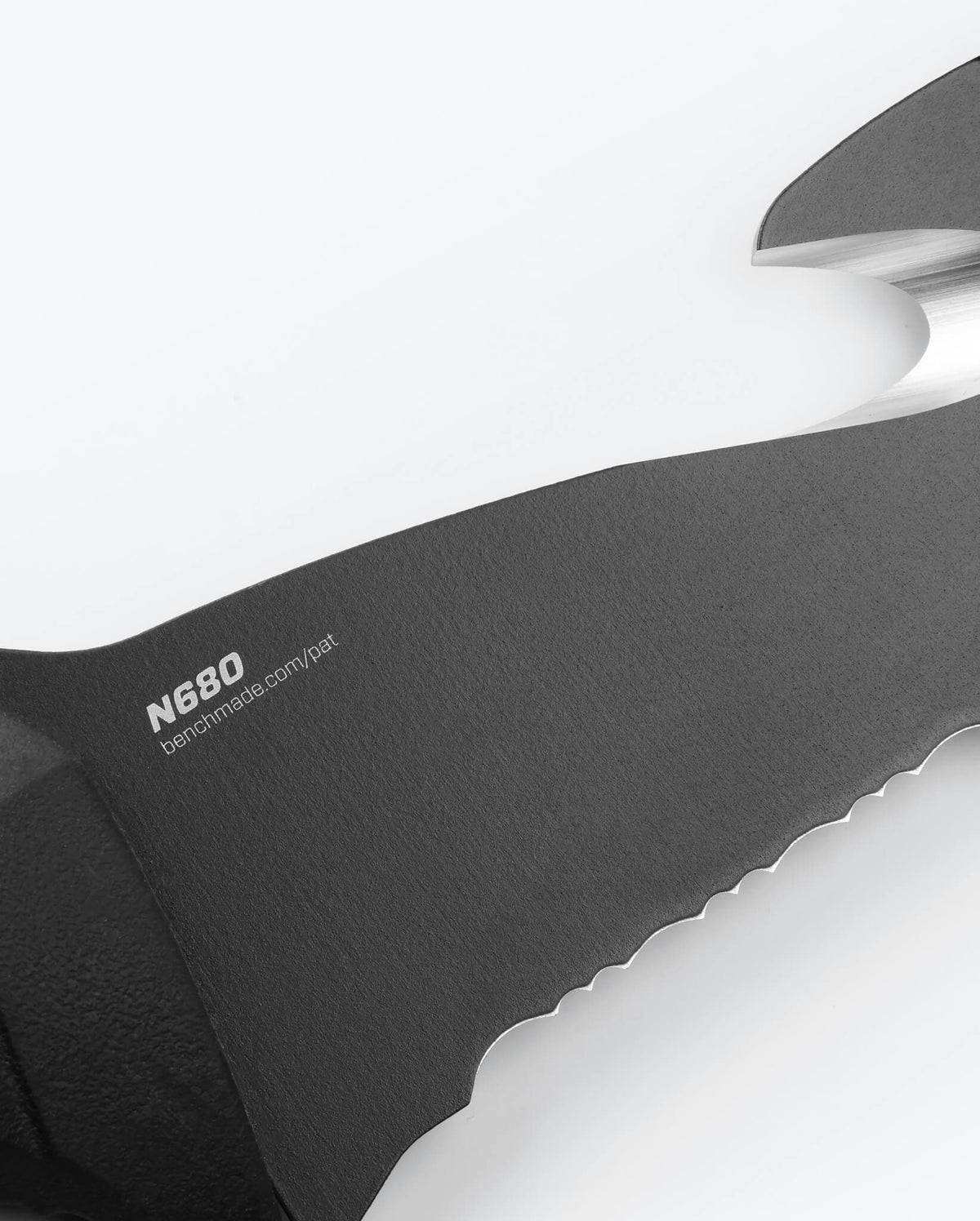 N680 Steel Blade Close-Up View Serrated Edge Detail - Benchmade Knife Co.