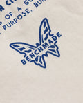 BKC Women's Oversized Fit Tee - Close-up of butterfly logo and mission text | Benchmade Knife Co.