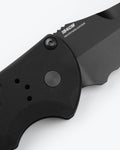 Auto Stryker® 154CM Steel Close-up - Button Detail | Benchmade Knife Co.