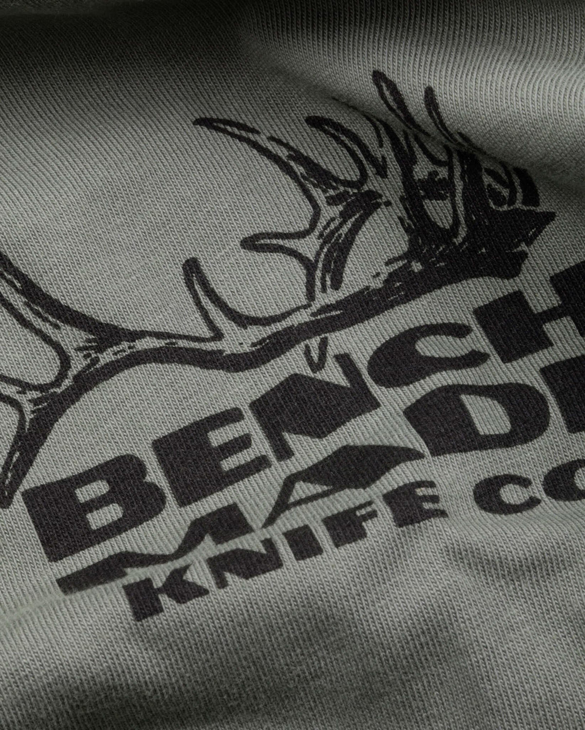 Antler SS Mens Tee - Close-up of Antler and Benchmade Logo Detail | Benchmade Knife Co.