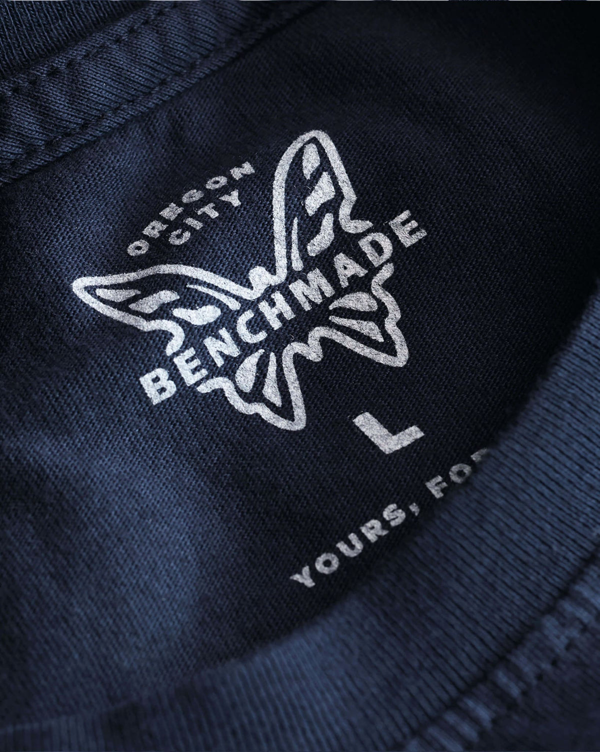 BKC Basic Tee - Close-up Benchmade Butterfly Logo Detail | Benchmade Knife Co.