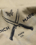 Meatcrafter Tactical Knives Detail - Close-up of Crossed Blades Logo | Benchmade Knife Co.