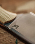 Station Knife Maple Valley Richlite - Blade Logo Detail | Benchmade Knife Co.